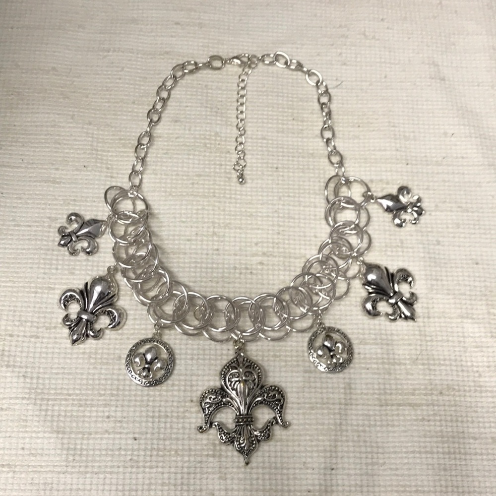 Stunning silver fleur de lis statement necklace